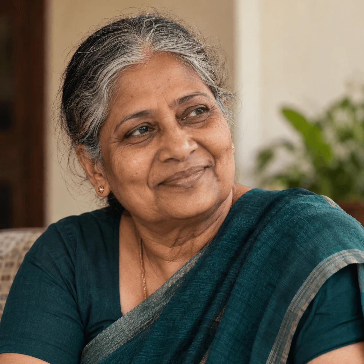 An elderly woman smiling softly