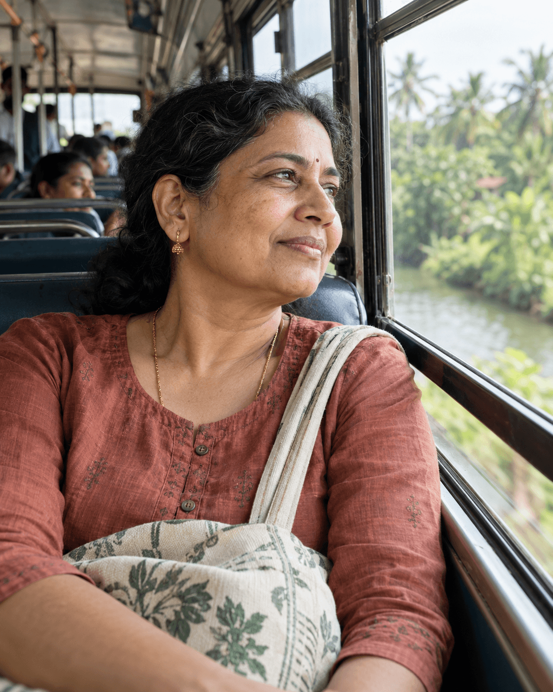 A woman smiling with quiet confidence